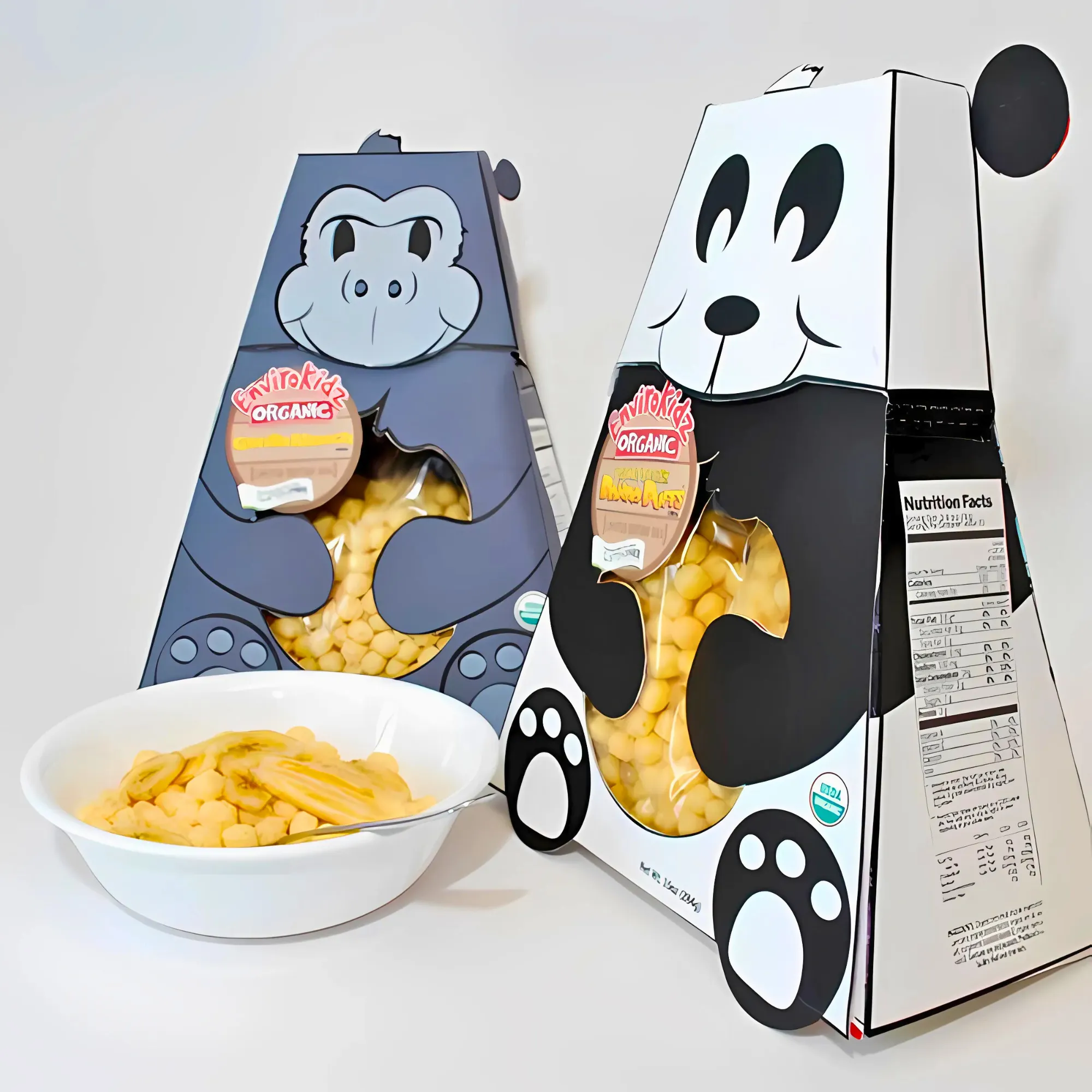 Two colorful cereal boxes with animal designs (gorilla and panda) alongside a bowl of cereal.