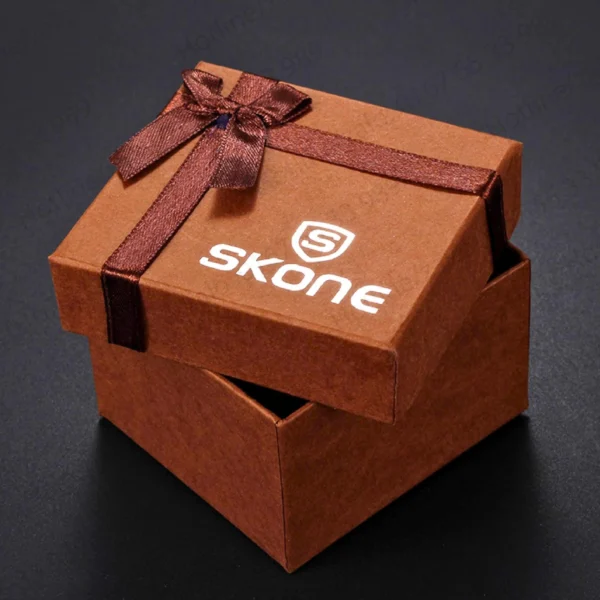 Brown gift box with a satin ribbon and logo