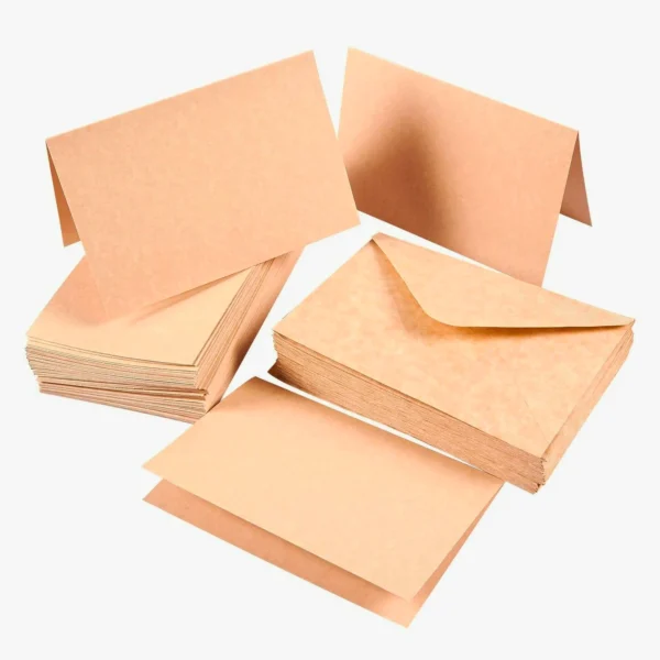 Brown kraft greeting cards and envelopes arranged for display.