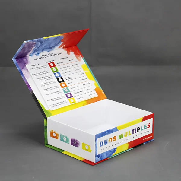 A colorful flip top magnetic lock box with a white interior. The box is open and the inside is visible, showing a list of different games.