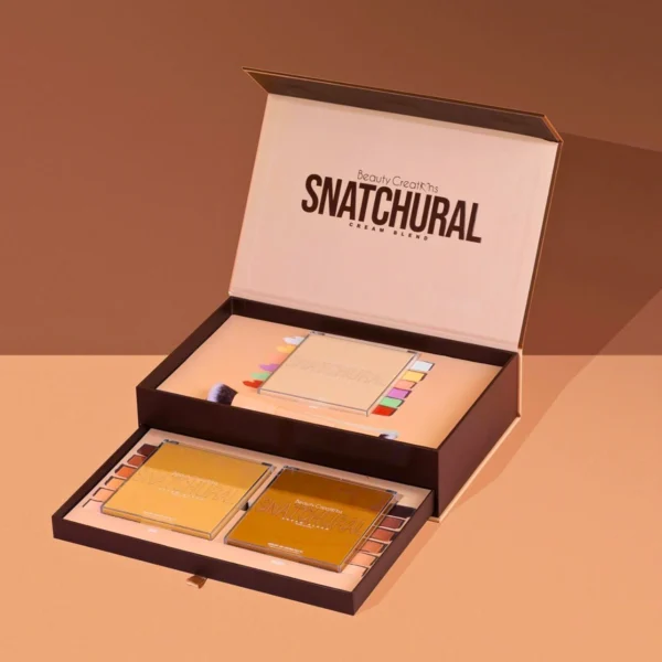 Luxurious cosmetics packaging displaying cream blend palettes.