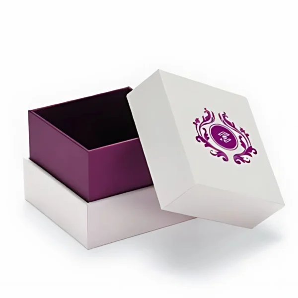 A white partial cover rigid box with a purple floral embellishment.