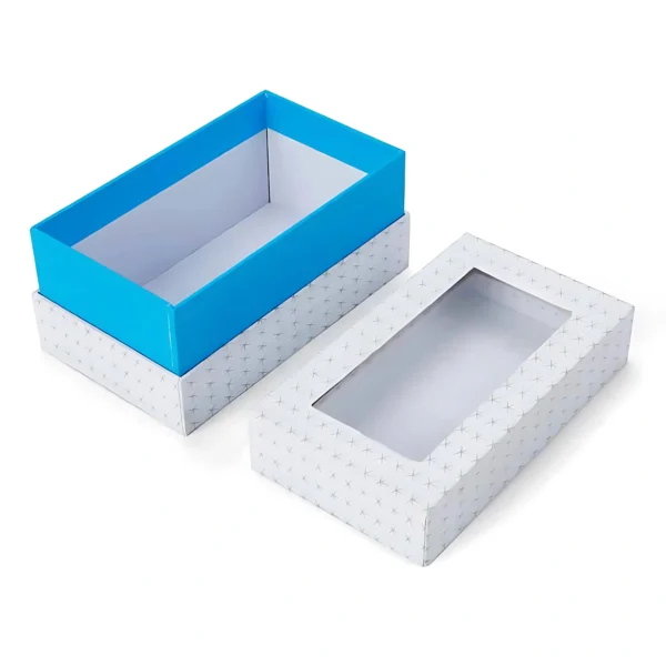A white partial cover rigid box with a blue interior and a clear window.