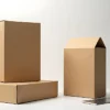 Three cardboard boxes in different sizes on a white surface with cutting tools.