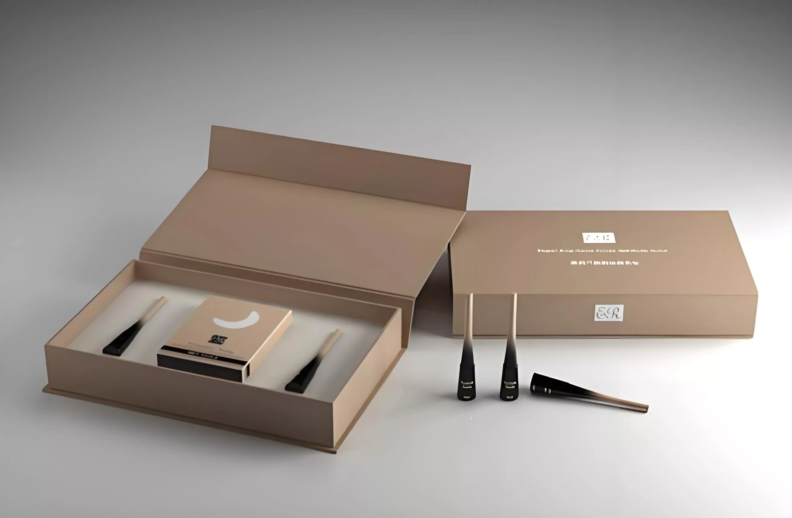 A sophisticated beauty product packaging set featuring a light tan box, opened to reveal a compact and two applicators resting on soft fabric.