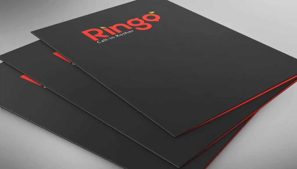 A set of black menu covers featuring the logo "Ringo" in red with the tagline "Call-in Kosher" printed below, showcasing a modern design.