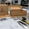 A packaging workspace showing how to choose the right box size for a product using measurements and custom packaging planning